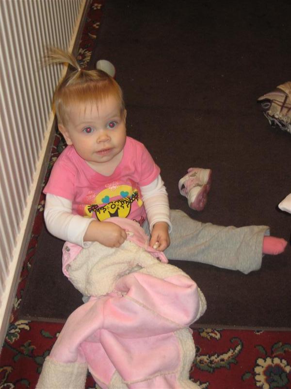 Jess_UKVisit2008 (11).JPG - UK - It's warm over here by the heater...